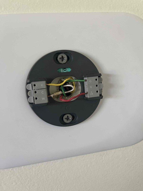 Responded to service call for newly installed smart thermostat not communicating with air conditioning system. Upon inspection, diagnosed wiring issue related to the common wire (C-wire) connection at the air handler. Verified thermostat wiring configuration at ceiling-mounted junction and traced connections to outdoor condensing unit. Corrected wire terminations and confirmed proper 24V communication between thermostat and HVAC system. Tested system operation and verified thermostat now successfully controls cooling functions.
