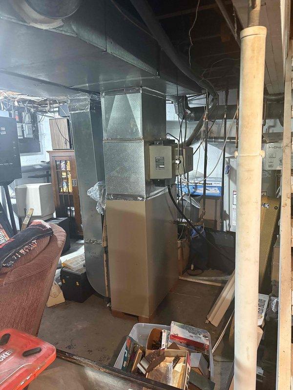Responded to service call for air conditioning unit making humming sound after 3:30 PM. Upon inspection, determined 30-year-old system had reached end of service life and required full replacement. Provided estimate for complete HVAC system replacement including outdoor condenser unit and indoor air handler.