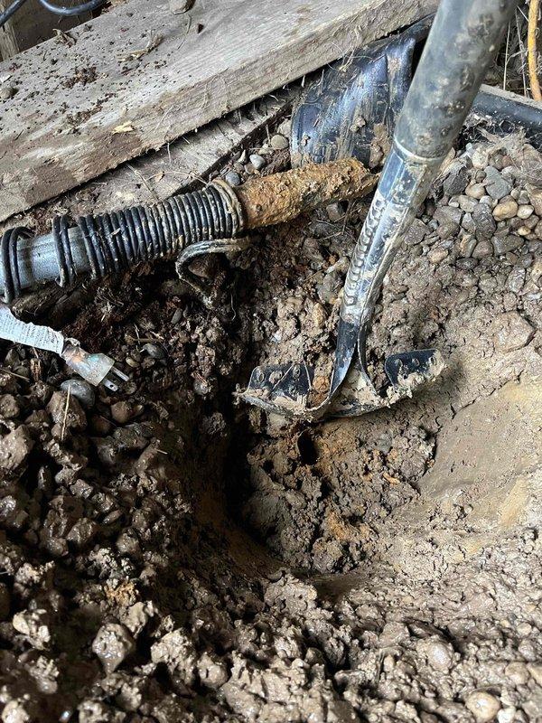 Responded to non-functioning pump-style water spigot in barn. Excavated and exposed underground plumbing connections to diagnose issue. Identified failed supply line requiring replacement. Installed new piping infrastructure, backfilled excavation, and restored spigot to full operational status.
