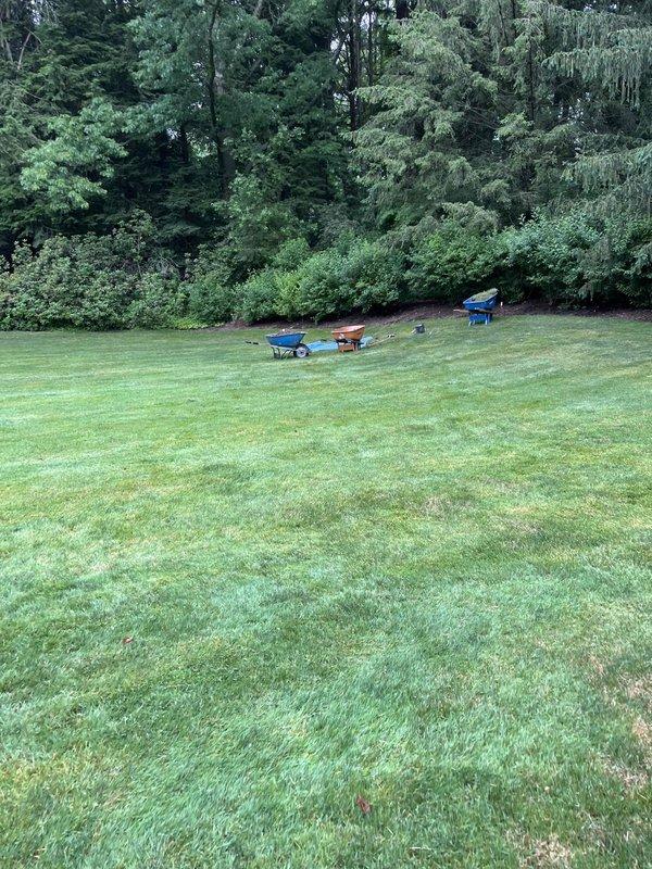Responded to emergency call for burst copper water line servicing a commercial irrigation system at a landscaping business property. Located and assessed the failed copper pipe section, which was part of a specialized irrigation configuration rather than a standard residential sprinkler system. Shut off water supply to stop active leak and prevent further water damage to the lawn area. Excavated affected section to expose the damaged copper line, removed the compromised pipe segment, and installed replacement copper piping with proper fittings and connections. Pressure tested the repaired line to ensure system integrity and verify no additional leaks were present. Backfilled excavation area and restored work site, leaving landscaping tools and materials staged for property owner's ongoing maintenance operations.
