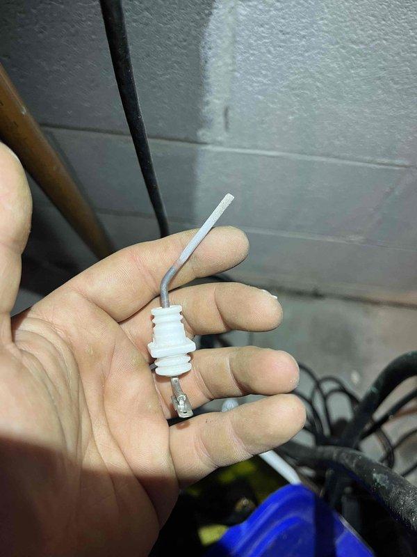 Responded to intermittent operation complaint on 7-8 year old Navien tankless water heater affecting shower performance. Diagnosed and replaced faulty flame rod sensor, which was causing inconsistent burner ignition and resulting in intermittent hot water delivery. Verified proper operation of unit after sensor replacement and confirmed stable temperature output to all fixtures.