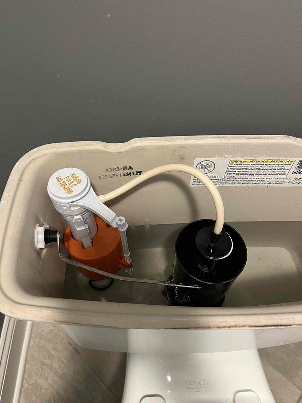 Completed toilet rebuild by replacing the flush valve assembly and fill valve mechanism. Installed new flapper, fill valve with float assembly, and refill tube to restore proper flushing and tank refill operation. All components tested and functioning correctly upon completion.
