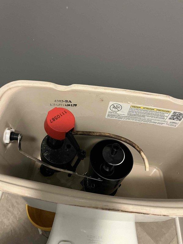 Completed toilet rebuild by replacing the flush valve assembly and fill valve mechanism. Installed new flapper, fill valve with float assembly, and refill tube to restore proper flushing and tank refill operation. All components tested and functioning correctly upon completion.
