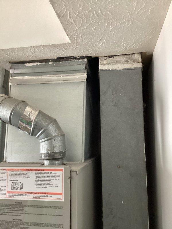 Completed comprehensive estimate for full HVAC system replacement on 25-year-old furnace and air conditioning unit. Assessed existing downdraft furnace and failing AC unit that required refrigerant recharge previous season and is no longer operating correctly. Provided replacement quote for 80% efficiency two-stage downdraft furnace paired with 2.5-ton 13.4 SEER R32 air conditioning unit with matching evaporator coil. Evaluated installation requirements including new refrigerant line set from outdoor condenser to indoor air handler. Documented existing gray metal ductwork and air handler installation in interior mechanical space, photographed current outdoor AC unit positioned on concrete pad against vinyl siding with electrical disconnect and conduit connections. Discussed equipment options, system sizing requirements, and financing alternatives for complete system replacement.