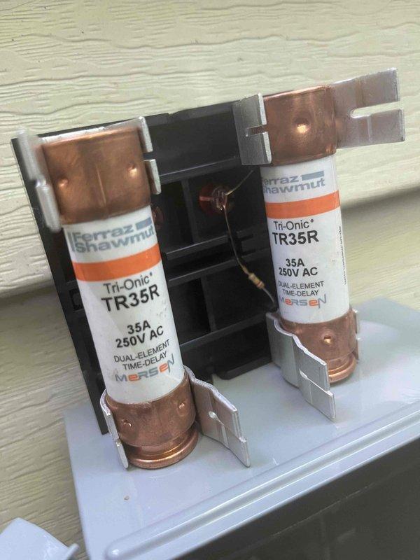 Completed mini split installation as previously approved and sold. Installed 35-amp dual element time-delay fuses in disconnect box for proper electrical protection. Verified unit level and plumb using precision measuring tools to ensure optimal system performance and proper condensate drainage.