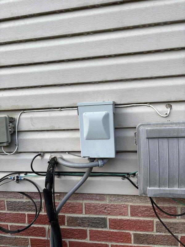 Completed comprehensive HVAC system evaluation for residential property requiring air conditioning replacement. Assessment included inspection of existing attic-mounted equipment, refrigerant line routing through structural framing, ductwork configuration, and exterior electrical service infrastructure to determine specifications and requirements for new system installation.