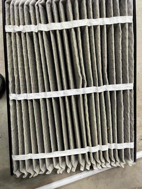 Completed cooling maintenance on dual air handler system per membership agreement. Inspected and documented air filter condition showing normal dirt accumulation, verified supply air temperature reading of 70.9°F at equipment, and performed standard preventive maintenance procedures on both units to ensure optimal system performance.