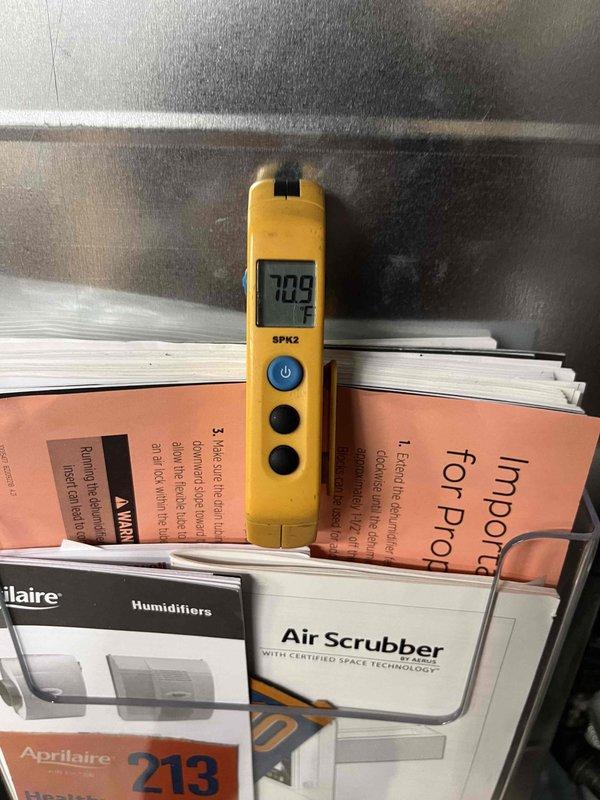 Completed cooling maintenance on dual air handler system per membership agreement. Inspected and documented air filter condition showing normal dirt accumulation, verified supply air temperature reading of 70.9°F at equipment, and performed standard preventive maintenance procedures on both units to ensure optimal system performance.