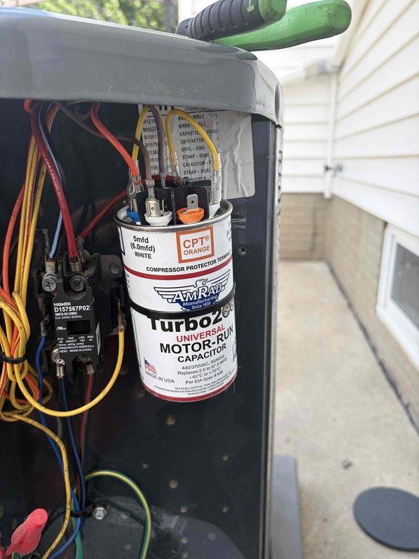 Responded to service call for air conditioning system that had stopped working. Upon arrival, performed diagnostic testing of outdoor unit components rather than proceeding directly with scheduled coil cleaning. Used digital multimeter to test capacitor functionality, measuring 36.96 microfarads on the run capacitor. Inspected electrical connections, contactor operation, and overall system components to determine root cause of system failure before proceeding with any repairs or maintenance work.