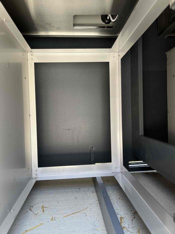 Conducted site assessment for gas line installation to service newly installed outdoor kitchen with dual grill setup. Evaluated existing gas line stub-out in backyard and determined routing requirements to connect two built-in stainless steel grills integrated into permanent cabinetry structure. Inspected grill cabinet interior access points and confirmed clearances for proper gas piping installation, connection points, and compliance with safety codes for outdoor gas appliance installations.