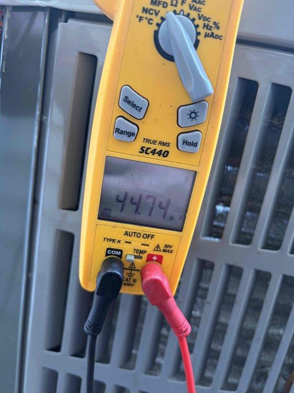 Responded to service call for noise concern on one-year-old replacement A/C unit that occurs during shutdown cycle. Performed system diagnostics and measured operating voltage at 24.12 VAC and amperage reading of 4474, confirming unit is functioning within normal parameters. Advised customer that shutdown noise is typical for this equipment and does not indicate impending failure.