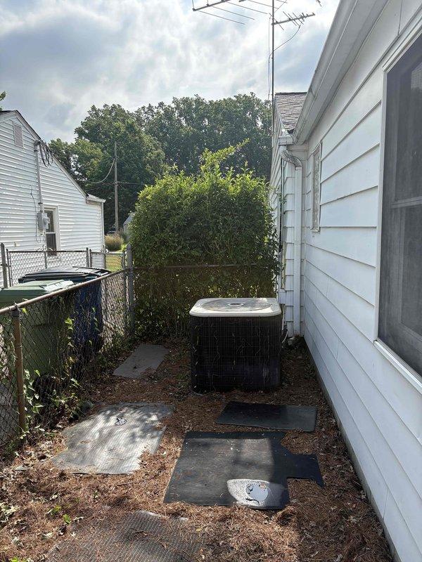 Responded to service call for outdoor HVAC unit failing to activate despite thermostat display functioning normally. Upon arrival, assessed Honeywell thermostat showing 80°F setpoint and inspected outdoor condenser unit located in side yard. After comprehensive system evaluation and discussing equipment age, condition, and repair costs versus replacement benefits, provided detailed estimate for complete HVAC system replacement to resolve operational failure and improve long-term reliability and efficiency.