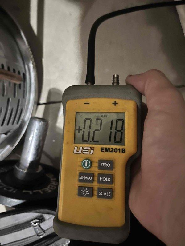 Responded to service call for newly installed furnace with non-operational air conditioning system. Performed diagnostic testing using refrigerant scale and digital manometer to verify system pressures and airflow measurements. Confirmed proper refrigerant charge levels and static pressure readings to ensure system operational parameters were within manufacturer specifications.