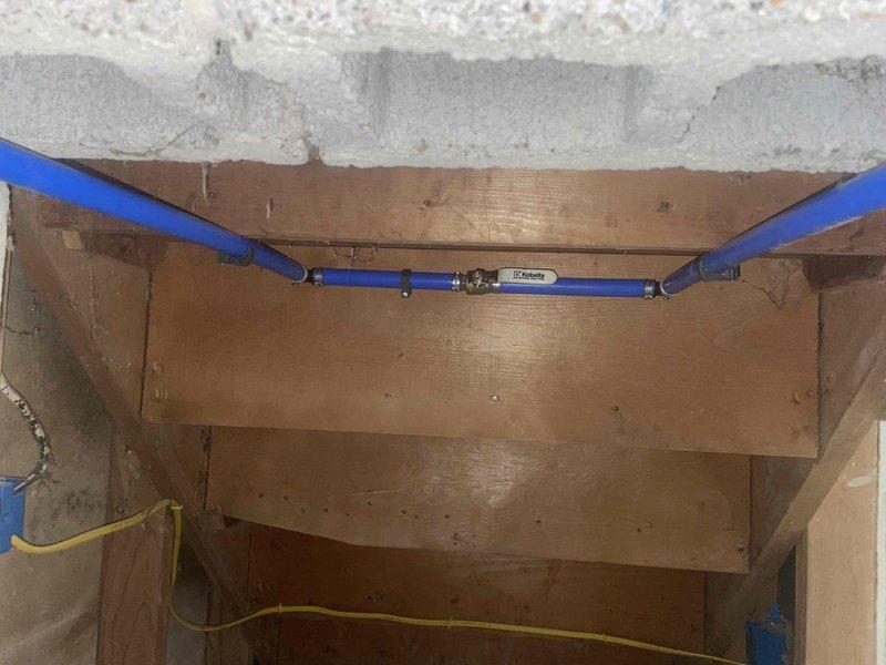 Completed installation of 40-gallon residential water heater as a like-for-like replacement unit in basement utility area. Connected supply and distribution lines including copper piping and PEX connections, installed expansion tank, and verified proper operation of all plumbing connections and hot water distribution system.