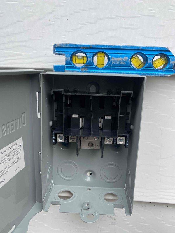 Completed full HVAC system installation per approved application #7025523. Installed electrical disconnect box on exterior wall, verified level installation and proper mounting. Performed system evacuation and vacuum test on refrigerant lines, achieving proper micron reading of 10.0 on digital vacuum gauge, confirming system integrity and readiness for refrigerant charge.
