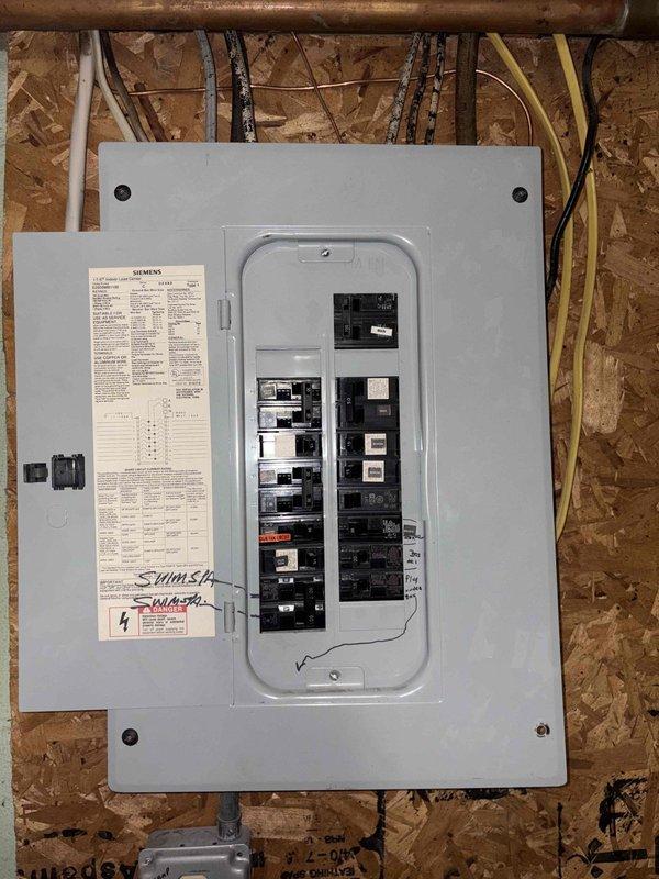 Conducted on-site assessment for mini split air conditioning installation in residential property currently equipped with boiler and air handler heating system. Evaluated bedroom area for indoor unit placement and reviewed existing Siemens electrical panel in basement to verify capacity for additional HVAC load requirements. Documented installation locations and confirmed electrical infrastructure suitable for mini split system integration.