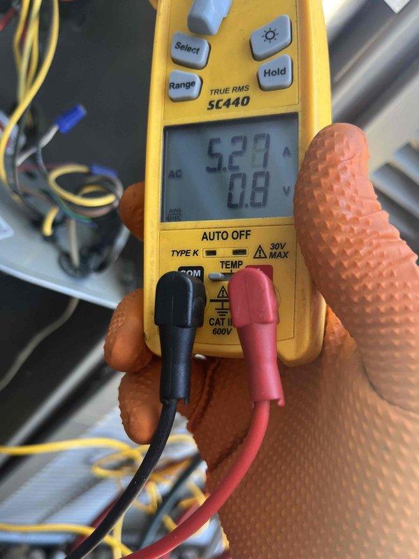 Completed cooling maintenance club visit on residential air handler system. Performed electrical diagnostics using digital multimeter, recording amperage draw of 52.7A on system components to verify proper operation within manufacturer specifications. Conducted comprehensive inspection of HVAC equipment located in basement mechanical room, including furnace unit and associated air handling components. Verified proper installation and routing of PVC condensate drain lines and exhaust venting. All systems operating normally with no deficiencies noted.
