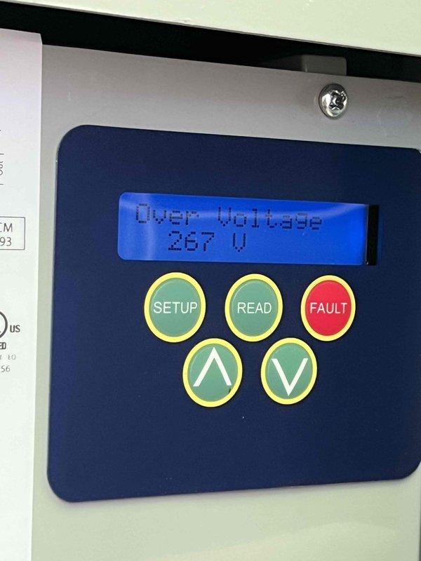 Responded to callback for newly installed HVAC system that failed to operate following electrical storm. Upon arrival, found air handler control board displaying "Over Voltage" fault at 267V on digital interface. Diagnosed incoming power surge damage to control board from storm event that exceeded normal 240V residential supply. Reset fault codes, verified proper voltage restoration at 240V, and confirmed all system components returned to normal operation with full functionality restored.