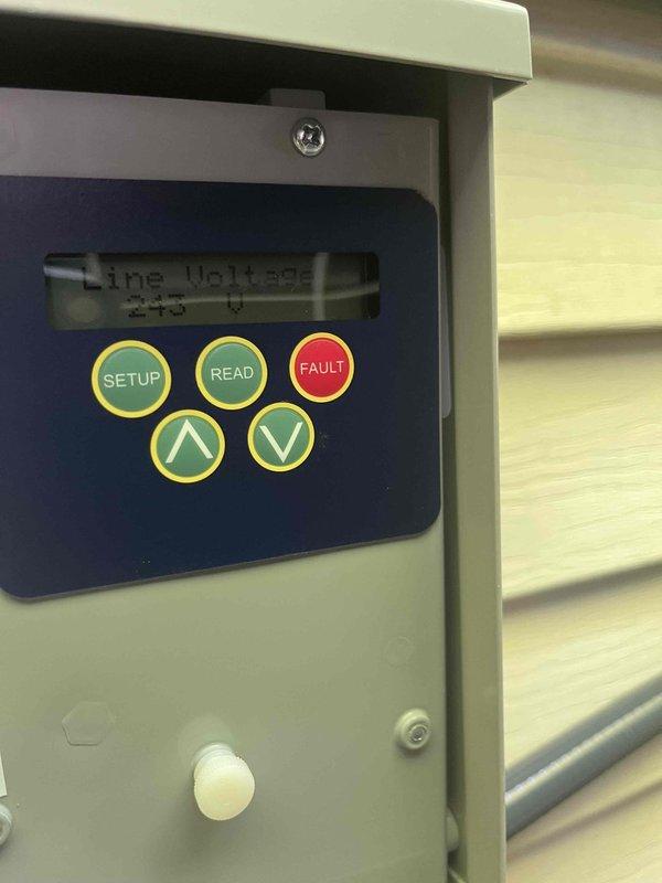 Responded to callback for newly installed HVAC system that failed to operate following electrical storm. Upon arrival, found air handler control board displaying "Over Voltage" fault at 267V on digital interface. Diagnosed incoming power surge damage to control board from storm event that exceeded normal 240V residential supply. Reset fault codes, verified proper voltage restoration at 240V, and confirmed all system components returned to normal operation with full functionality restored.