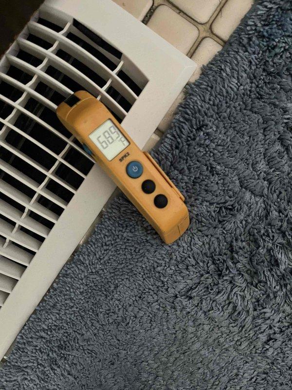Performed diagnostic evaluation on 1-year-old heat pump system following previous fall maintenance notation. Measured static pressure at -0.340 using digital manometer and verified supply register airflow and temperature output. Unit is currently operating in heating mode with proper output; however, refrigerant charge verification remains pending until ambient temperatures exceed 55°F to allow accurate cooling mode assessment per manufacturer specifications.