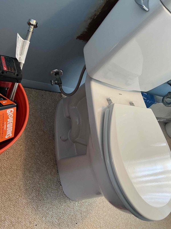 Responded to service call for malfunctioning downstairs toilet with failed internal components and leaking faucet. Removed and replaced defective toilet unit with new two-piece porcelain fixture. Installed new toilet with proper sealing, connected water supply line, and verified proper flush operation and water flow. Addressed leaking downstairs faucet issue to restore proper function.