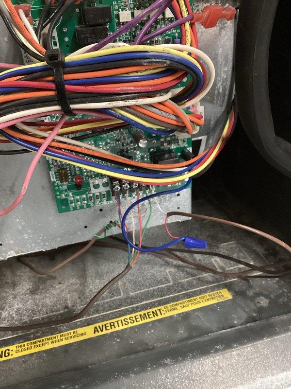 Responded to no-cooling complaint on residential HVAC system. Diagnosed refrigerant deficiency in unit requiring R-22 refrigerant. System evaluated and determined suitable for continued operation with refrigerant recharge. Goodman furnace and air handler inspected, control board wiring and connections verified operational.