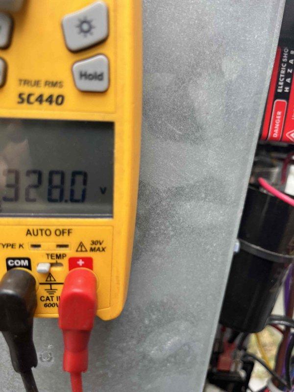 Completed club maintenance visit on dual HVAC systems per customer request. Performed comprehensive system diagnostics using calibrated test equipment to measure temperature differentials, airflow, and electrical parameters. Recorded supply and return air temperatures showing proper split of 23.0°F on primary system, indicating adequate refrigerant charge and heat exchange efficiency. Verified system voltage at 328.0V confirming stable electrical supply to equipment. Inspected condenser coil fins and heat exchanger components for proper operation. Both systems evaluated and found operating within normal parameters with no immediate service needs identified.