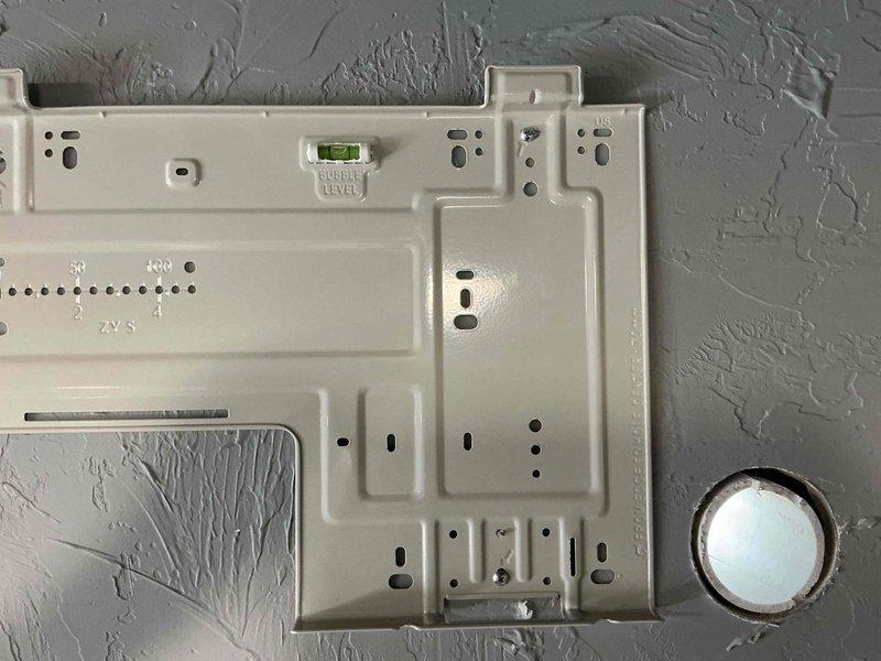Completed installation of Midea mini-split HVAC system. Mounted indoor air handler unit to interior wall using manufacturer-provided bracket with integrated leveling system, verified proper alignment and secure attachment. Connected refrigerant lines, electrical wiring, and condensate drain per manufacturer specifications, documented equipment serial number and technical data for warranty registration.