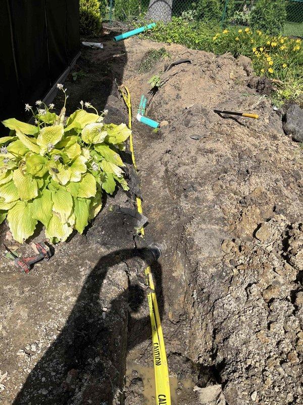 Completed follow-up installation of gas line for pool heater system. Excavated trench along building foundation in compliance with OUPS locate requirements and AT&T high-profile facility protocols, utilizing mandatory hand-digging methods within statutory tolerance zones. Installed gas piping with proper fittings and connections, coordinating with Enbridge utility services throughout the installation process to ensure safe clearance from existing underground infrastructure.