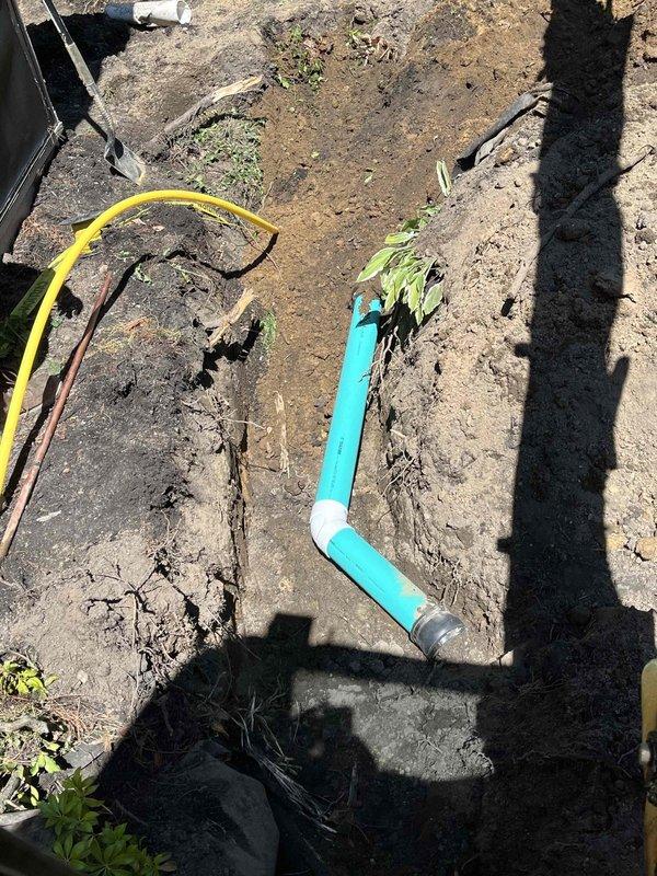 Completed follow-up installation of gas line for pool heater system. Excavated trench along building foundation in compliance with OUPS locate requirements and AT&T high-profile facility protocols, utilizing mandatory hand-digging methods within statutory tolerance zones. Installed gas piping with proper fittings and connections, coordinating with Enbridge utility services throughout the installation process to ensure safe clearance from existing underground infrastructure.