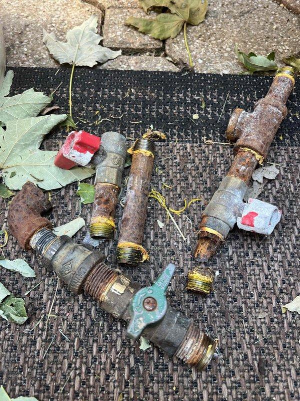 Returned to property to complete installation of new gas line for outdoor kitchen area. Removed and replaced severely corroded gas line fittings and valves that exhibited extensive rust deterioration and oxidation throughout the system. Old components showed significant safety concerns due to advanced corrosion on brass and bronze threaded connections. Installed new gas line piping with proper fittings and valves to restore safe gas supply to outdoor cooking area. All connections were tested for leaks and verified operational. System now functioning properly with new infrastructure in place.