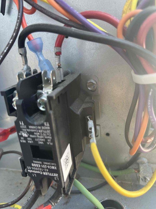 # HVAC Service Report - No Cool Condition

Responded to service call for reduced cooling performance on 10+ year old HVAC system. Upon arrival, customer reported unit was still operational but not maintaining adequate temperature. Performed system diagnostics and visual inspection of both indoor and outdoor components.

Inspected electrical control panel and contactor assembly. Found contactor showing signs of wear consistent with age of equipment. Verified all electrical connections at contactor, checking wire terminals in multiple circuits including control voltage and line voltage connections. Confirmed proper wire management and secure mounting of all components within control panel.

Evaluated thermostat operation and programming settings. Thermostat displayed active cooling mode with digital readout showing current temperature setting. Verified thermostat communication with HVAC system and proper stage operation. Checked system configuration showing multi-stage capability.

Docum