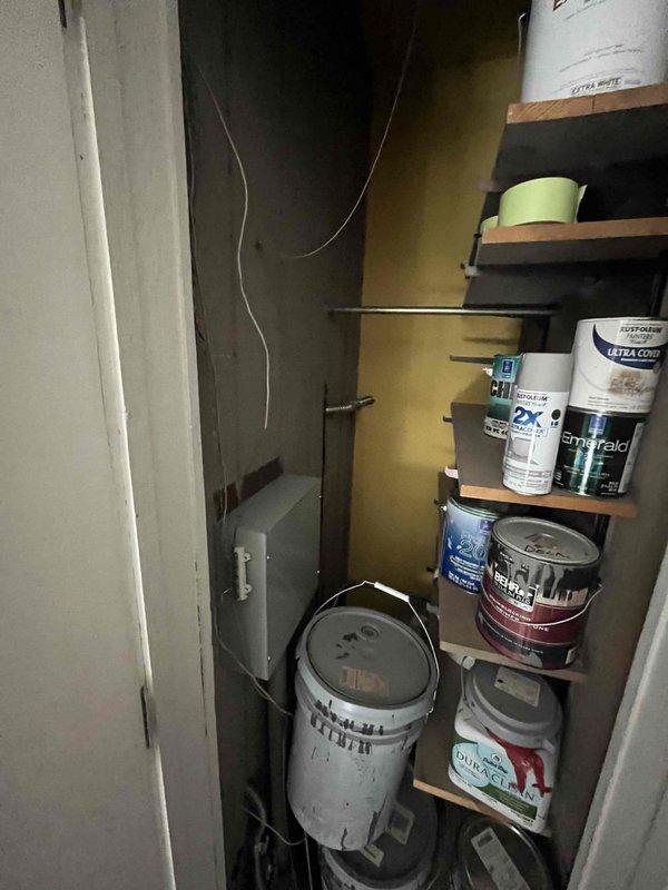 Responded to service call regarding second floor AC return air issues. Accessed attic space and inspected return air system configuration. Documented existing conditions with photos showing vaulted ceiling area with wooden planking and adjacent storage space where return air ducting is located. Identified access point through utility closet area with exposed wiring and ductwork. Further diagnostic work required to determine proper resolution for return air flow concerns.