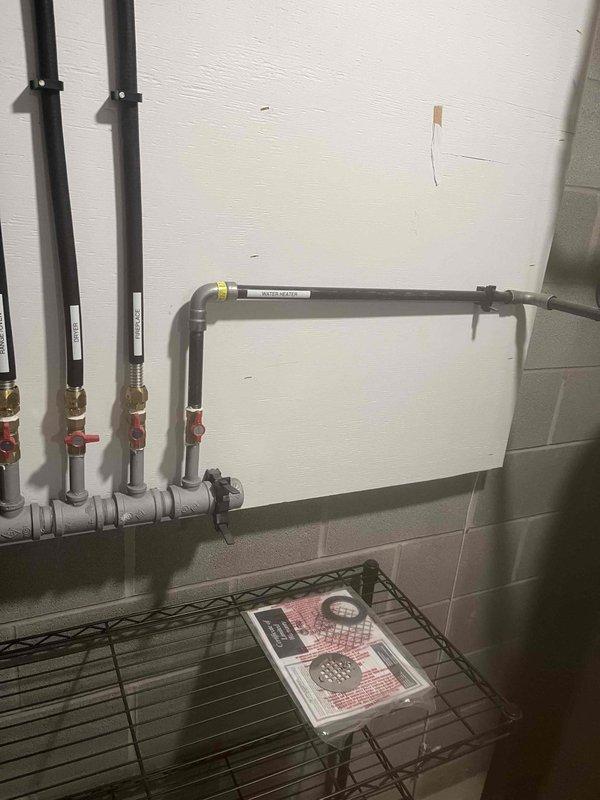 Responded to a no hot water call involving a Rheem power-vent water heater displaying an ignition lockout error. Upon inspection, diagnosed the ignition failure issue and successfully reset the system after verifying proper gas supply, venting configuration, and electrical connections. Confirmed water heater returned to normal operation with proper ignition sequence and hot water delivery restored to the residence.