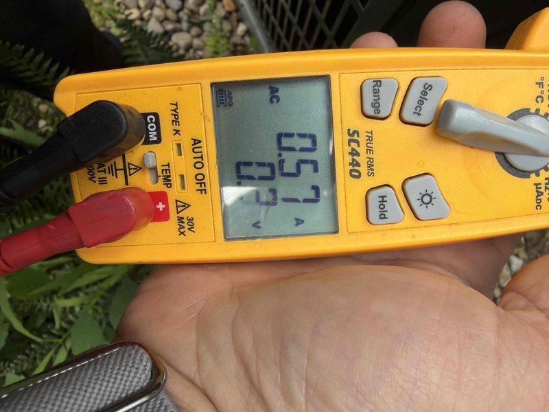Completed scheduled cooling maintenance member visit. Inspected electrical components including contactor assembly and verified proper terminal connections. Performed voltage readings using digital multimeter, confirming AC voltage at 25.1V on measured circuit. All electrical connections found secure and system operating within normal parameters.