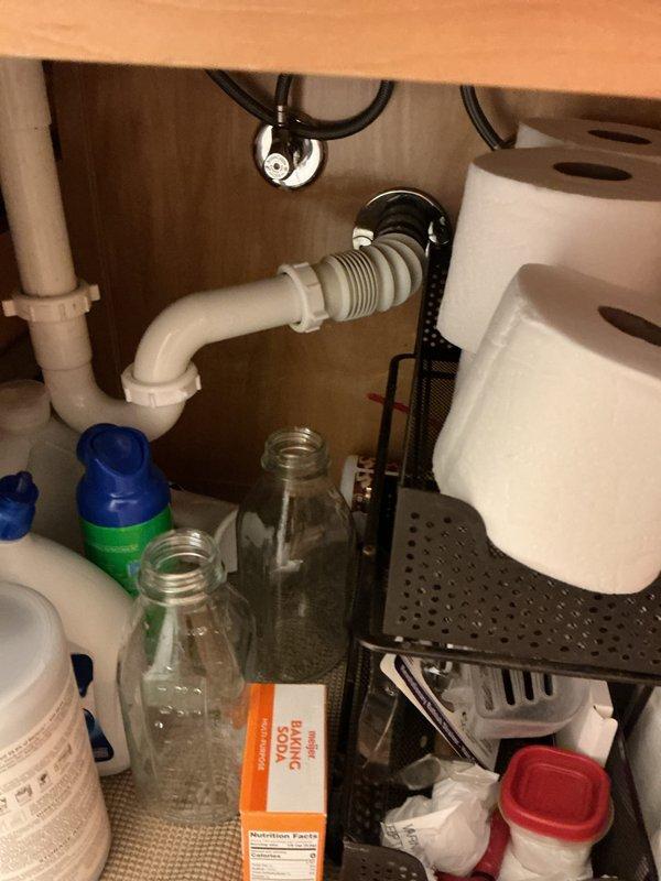 Completed routine plumbing maintenance inspection as part of recurring membership service. Inspected under-sink plumbing connections, drain trap assembly, and supply lines in kitchen area, confirming proper operation and no visible leaks. Evaluated bathroom shower fixtures including dual showerhead system, handheld spray unit, mounting hardware, and safety grab bar installation for proper function and secure mounting.