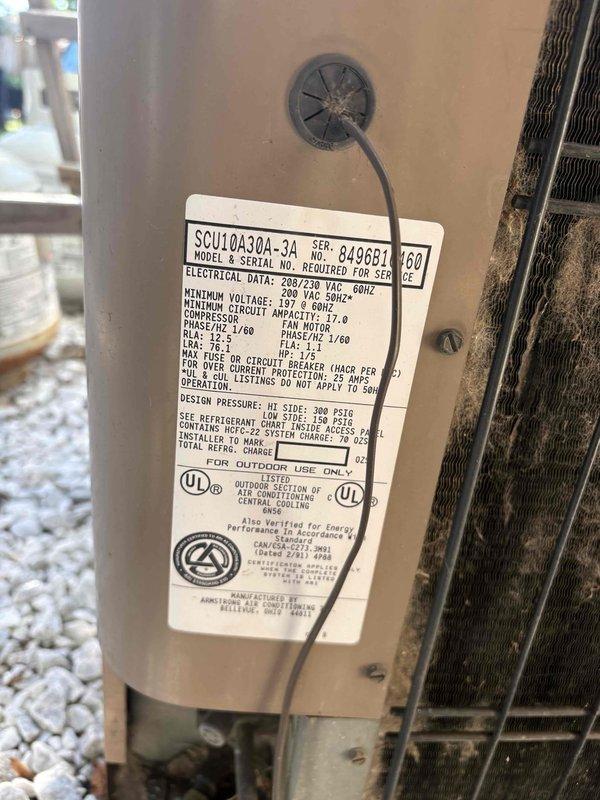 Conducted comprehensive assessment of existing 30+ year old HVAC system for replacement estimate. Evaluated current heating and air conditioning equipment operational status, documented existing outdoor condensing unit (Model SCU10A30A-31) and indoor air handling components in basement installation, and photographed equipment specifications and installation conditions to provide accurate replacement recommendations for aging residential comfort system.