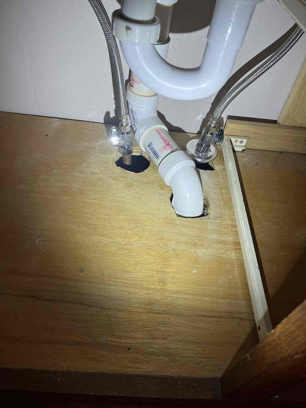 Performed site assessment for faucet replacement at residential bathroom sink. Inspected existing dual-handle chrome faucet assembly and verified operational status of fixture. Documented under-sink plumbing configuration including braided stainless steel supply lines, shut-off valves, and P-trap drain assembly. Confirmed accessibility of connections and provided customer with specifications for compatible replacement fixtures to be supplied prior to installation scheduling.