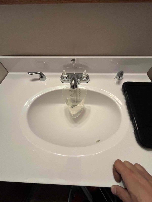 Performed site assessment for faucet replacement at residential bathroom sink. Inspected existing dual-handle chrome faucet assembly and verified operational status of fixture. Documented under-sink plumbing configuration including braided stainless steel supply lines, shut-off valves, and P-trap drain assembly. Confirmed accessibility of connections and provided customer with specifications for compatible replacement fixtures to be supplied prior to installation scheduling.