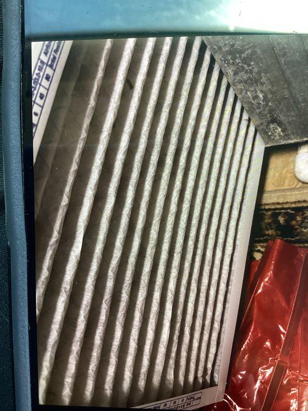 Completed cooling maintenance club member visit on air handler system. Inspected and documented air filter condition, noting dust accumulation on pleated media indicating normal usage since last service interval. Performed standard preventive maintenance procedures per membership agreement to ensure optimal system performance and efficiency.