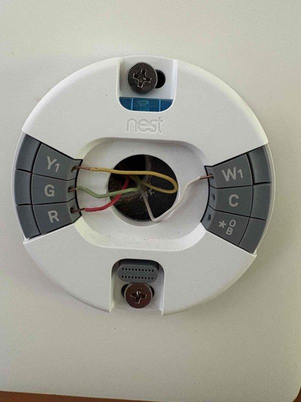 Conducted comprehensive evaluation of 30-year-old air conditioning system for replacement estimate. System has required multiple refrigerant recharges and operational status remains uncertain as unit has not been tested this season. Assessed existing equipment configuration, measured clearance dimensions in mechanical room, documented current installation including copper refrigerant lines, electrical conduit, and Nest thermostat wiring connections. Single-unit residential system evaluated for complete HVAC replacement recommendation.