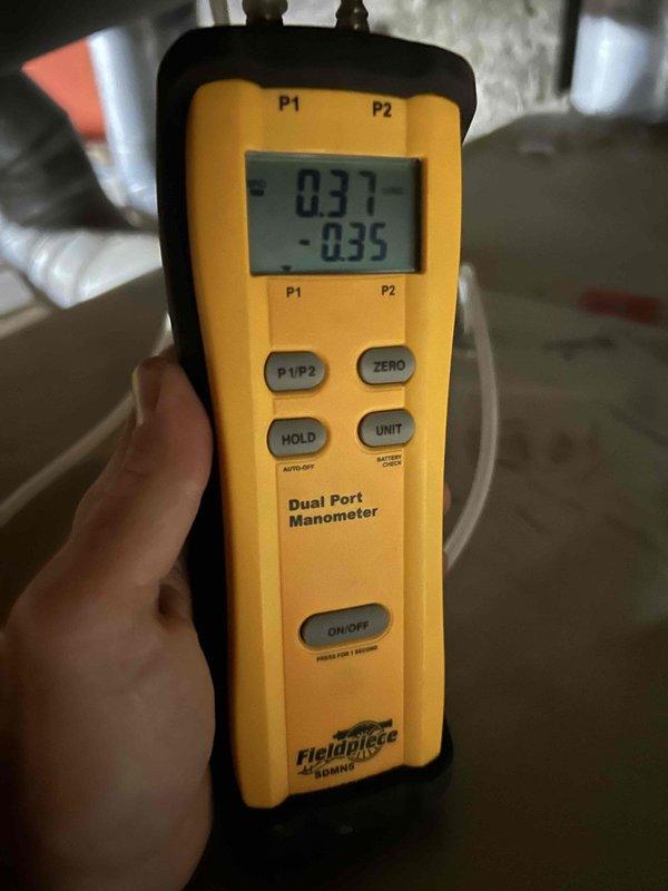 Performed comprehensive tune-up on 8-year-old air conditioning system experiencing reduced cooling capacity. Cleaned outdoor condenser coils as requested, measured system pressures using dual-port manometer showing balanced readings, and verified refrigerant line temperature at 324°F indicating proper superheat levels. System restored to optimal operating performance with all components functioning within manufacturer specifications.