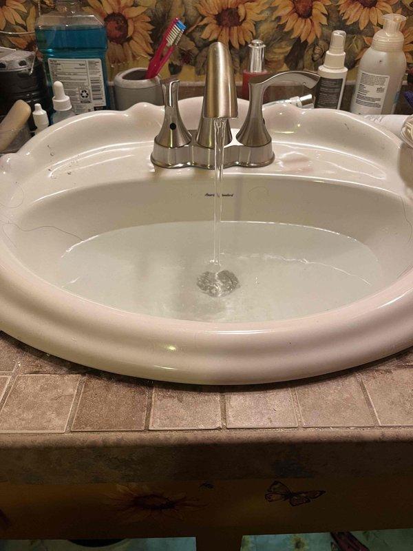 Responded to callback for dripping bathroom sink following previous service visit. Upon inspection, identified leak at faucet requiring adjustment of supply line connections and valve seats. Tightened flexible supply hoses beneath vanity and verified proper shutoff valve operation. Tested faucet operation and confirmed leak resolution with no active dripping.

Performed scheduled tankless water heater maintenance including descaling heat exchanger, cleaning inlet filter screen, and inspecting burner assembly and ignition components. Verified proper gas pressure and combustion efficiency. Flushed system with manufacturer-recommended solution to remove mineral buildup.

Diagnosed inoperative garbage disposal unit. Found disposal jammed due to foreign object obstruction. Cleared blockage using allen wrench method at base reset port. Tested disposal motor function and blade rotation. Verified proper electrical connection and reset circuit breaker. Confirmed unit operates normally with adeq
