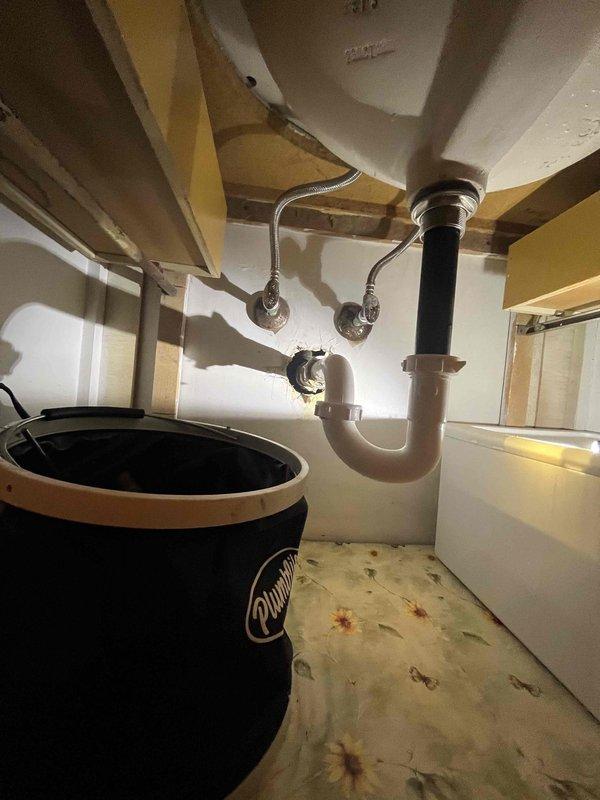 Responded to callback for dripping bathroom sink following previous service visit. Upon inspection, identified leak at faucet requiring adjustment of supply line connections and valve seats. Tightened flexible supply hoses beneath vanity and verified proper shutoff valve operation. Tested faucet operation and confirmed leak resolution with no active dripping.

Performed scheduled tankless water heater maintenance including descaling heat exchanger, cleaning inlet filter screen, and inspecting burner assembly and ignition components. Verified proper gas pressure and combustion efficiency. Flushed system with manufacturer-recommended solution to remove mineral buildup.

Diagnosed inoperative garbage disposal unit. Found disposal jammed due to foreign object obstruction. Cleared blockage using allen wrench method at base reset port. Tested disposal motor function and blade rotation. Verified proper electrical connection and reset circuit breaker. Confirmed unit operates normally with adeq