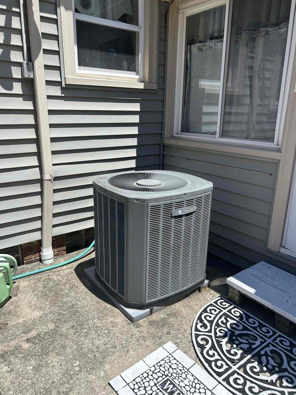 Completed comprehensive air conditioning tune-up on 15-year-old residential outdoor unit. System evaluated and found operating within normal parameters with no issues reported by homeowner. Performed standard maintenance protocol including temperature diagnostics showing 69°F supply air reading, visual inspection of condenser unit exterior components, verification of proper installation on concrete pad, and assessment of clearances around equipment. All components functioning properly with no immediate service needs identified.