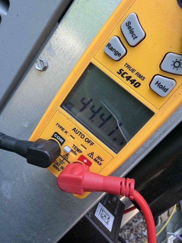 Completed cooling maintenance on two air handler units per club membership agreement. Performed comprehensive system diagnostics using digital multimeter to verify electrical parameters and measure voltage readings across components. All measurements confirmed proper operation within manufacturer specifications. Captured documentation of diagnostic readings showing system operating at 441V and 46.97V at respective test points. Inspected electrical connections, wiring bundles, and control circuits within air handler enclosures. Both units found operating normally with no deficiencies noted.