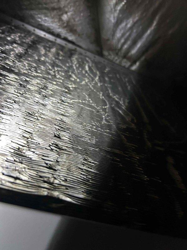 Completed indoor evaporator coil cleaning and one-time cooling system maintenance. Accessed attic-mounted air handler unit and thoroughly cleaned indoor coil to remove accumulated dust, debris, and biological growth that restricts airflow and reduces system efficiency. Performed comprehensive cooling maintenance inspection including filter replacement, refrigerant level verification, electrical connection inspection, condensate drain line clearing, and thermostat calibration. Verified proper airflow through flexible ductwork system and confirmed all components operating within manufacturer specifications. System restored to optimal cooling performance with improved energy efficiency.