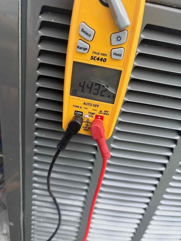 Completed cooling maintenance on air handler unit for club member. Performed electrical diagnostics using digital multimeter, recording voltage readings of 442V at the equipment. Inspected exterior electrical disconnect box and conduit connections to ensure proper system operation and safety compliance.