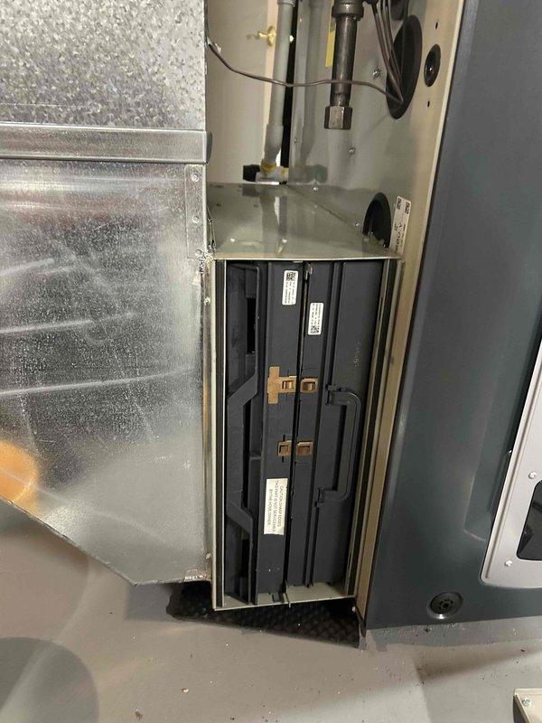 Completed comprehensive AC tune-up and preventative maintenance on residential air conditioning system. System found operating within normal parameters with no reported issues or concerns. Performed standard inspection of air handler unit, verified electrical connections and components, checked refrigerant lines and condensate management, and confirmed thermostat functionality displaying proper temperature control at 70 degrees.