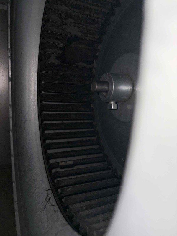 Performed comprehensive AC tune-up service on residential cooling system. Inspected blower assembly and found moderate dust accumulation on squirrel cage fan blades; cleaned and verified proper motor operation. Replaced faulty electrical disconnect component with new terminal block to ensure safe system operation and proper electrical connection.